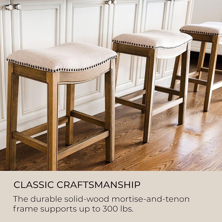 Adrien Brown Backless Saddle Wood Counter Stool