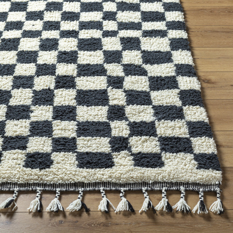 Black and Ivory Geometric Wool Rug with Tassels