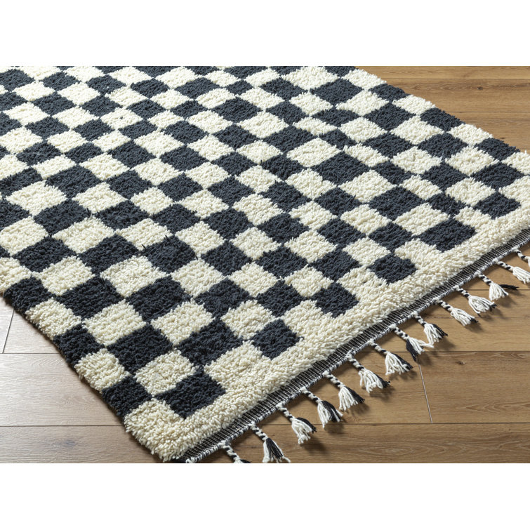 Black and Ivory Geometric Wool Rug with Tassels