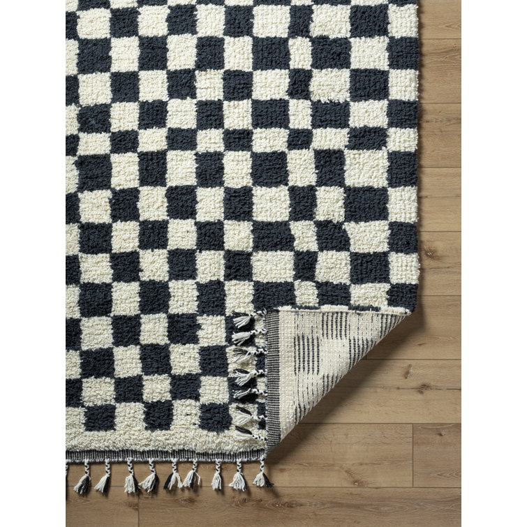 Black and Ivory Geometric Wool Rug with Tassels