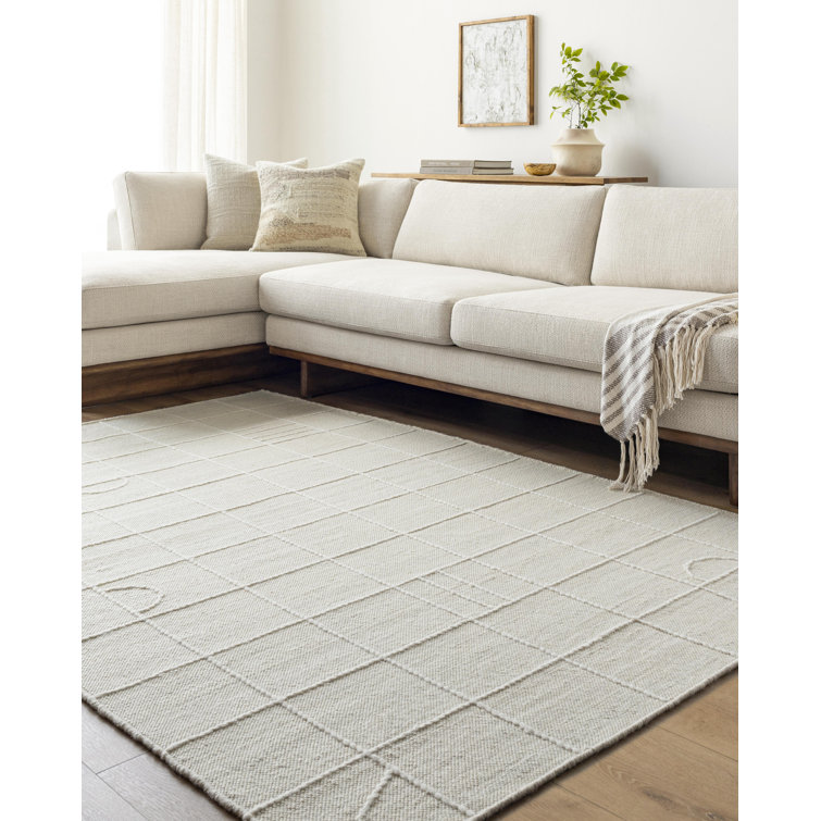 Loeb Cream and White Hand-Tufted Wool 5' x 7' Rug