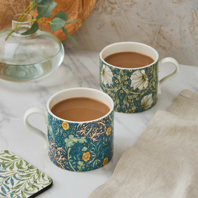 Elegant White Ceramic Mugs with Floral Designs, Set of 2