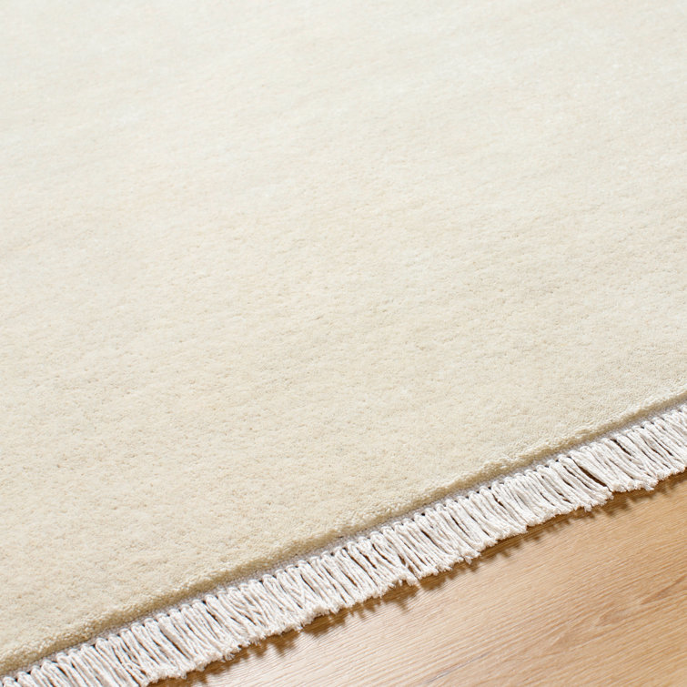 Handmade Beige Wool Fringed 6' x 9' Area Rug