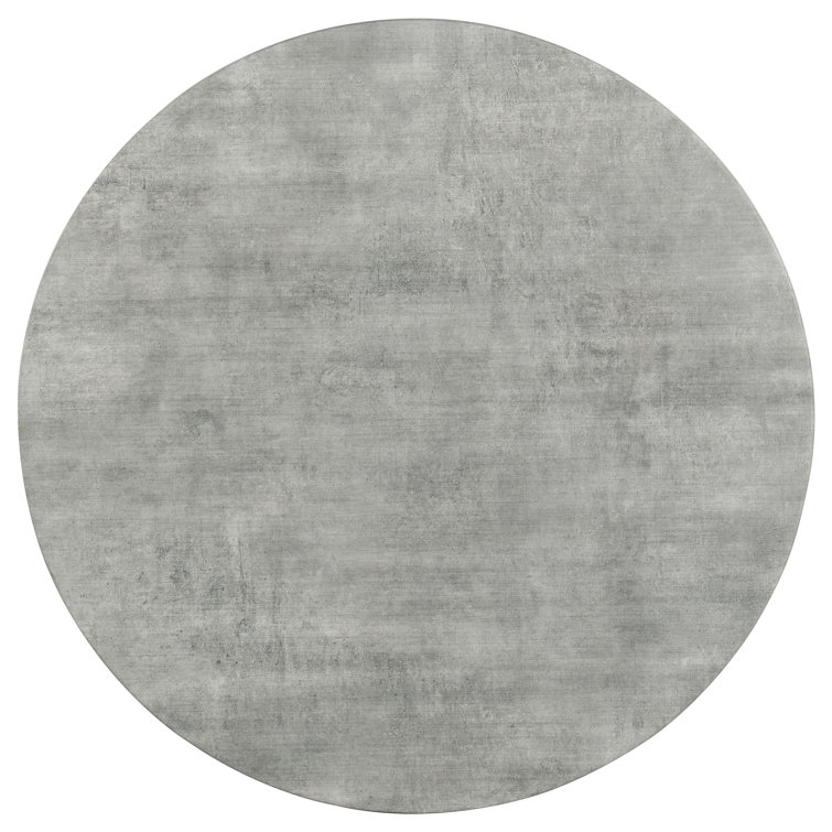 Transitional Round Coffee Table with Faux Cement Top and Gunmetal Legs