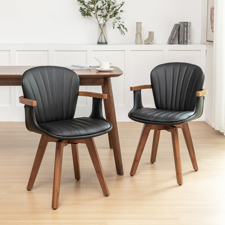 Black Faux Leather Swivel Dining Chairs with Bamboo Legs