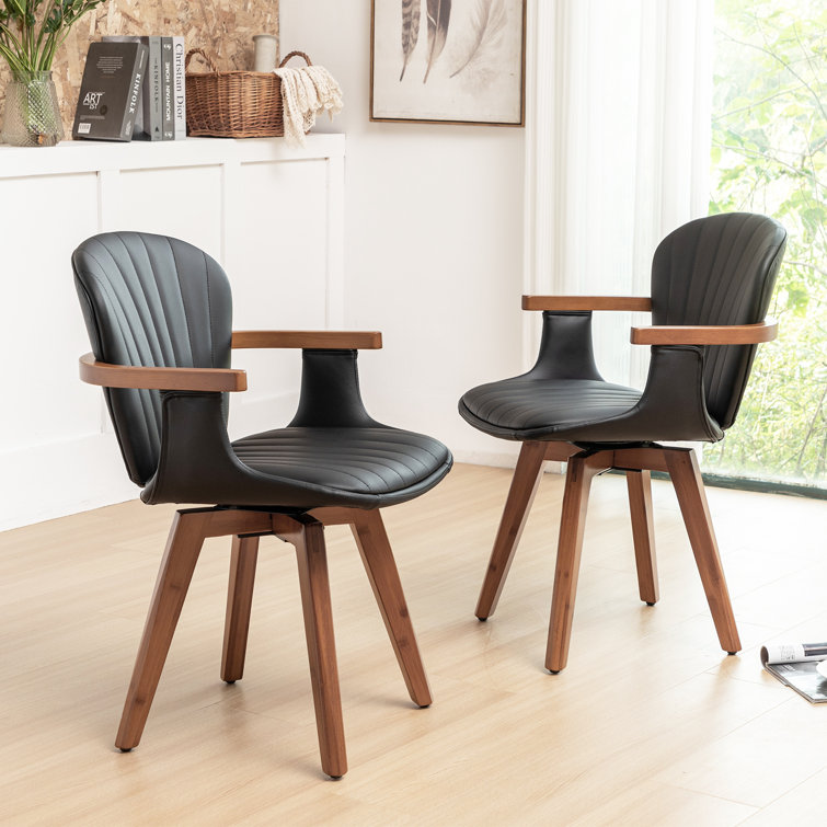 Black Faux Leather Swivel Dining Chairs with Bamboo Legs