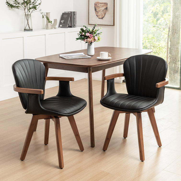 Black Faux Leather Swivel Dining Chairs with Bamboo Legs