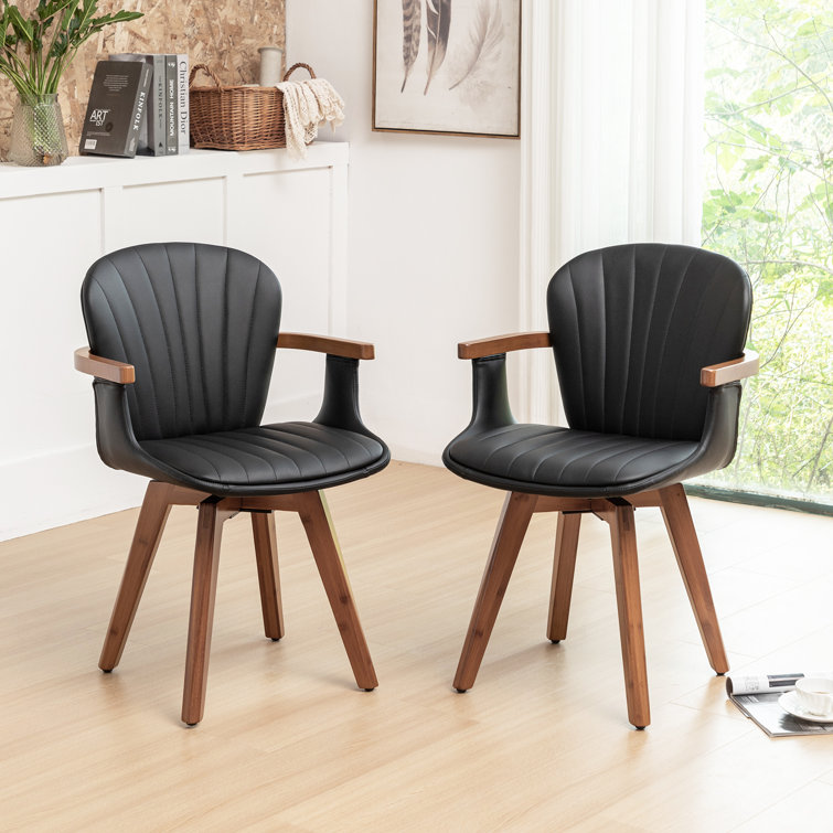 Black Faux Leather Swivel Dining Chairs with Bamboo Legs