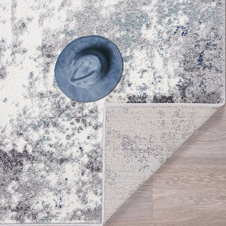 Ivory and Gray Abstract Synthetic Area Rug 4' x 5'