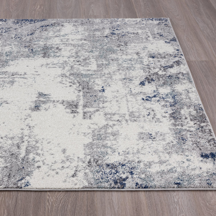 Ivory and Gray Abstract Synthetic Area Rug 4' x 5'
