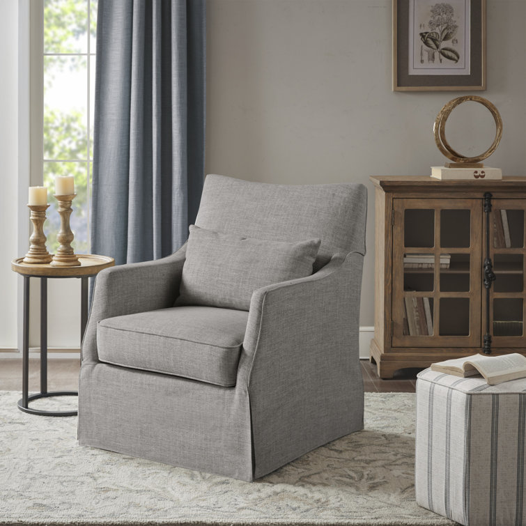 Gray Skirted Swivel Armchair with Lumbar Pillow