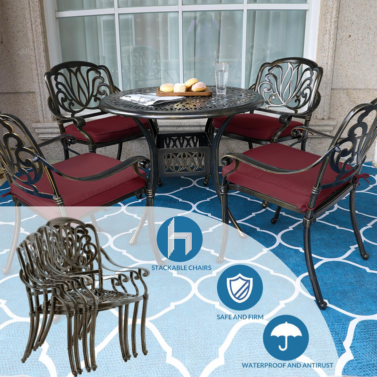 4-Person Round Black Metal Outdoor Dining Set with Chili Red Cushions