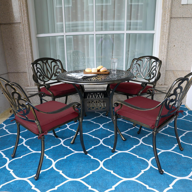 4-Person Round Black Metal Outdoor Dining Set with Chili Red Cushions
