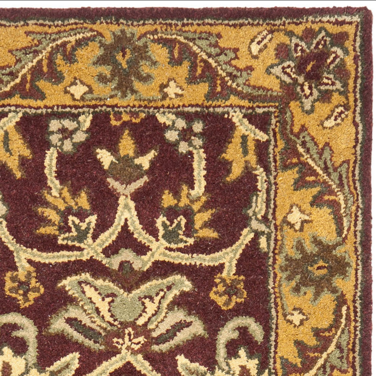 Handmade Round Burgundy and Gold Wool Area Rug