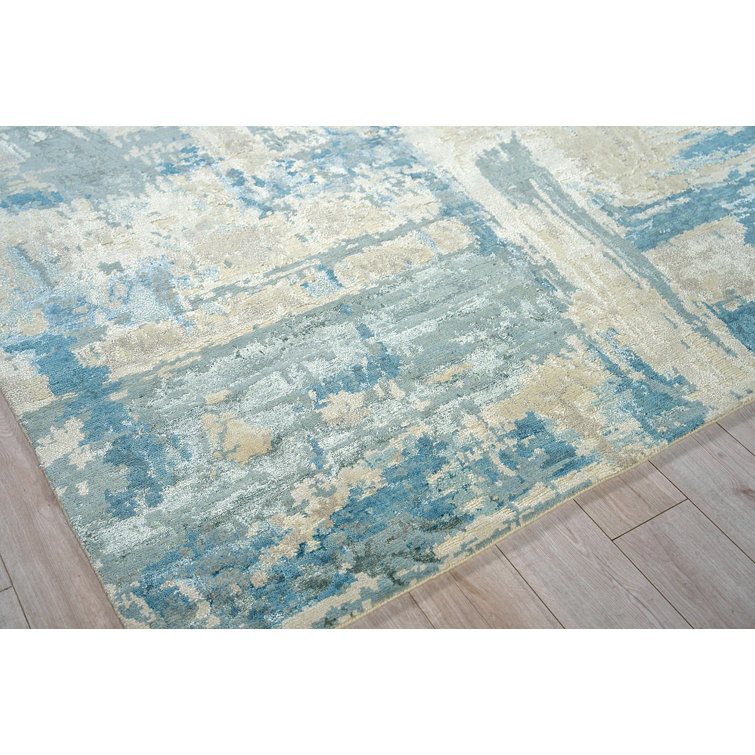 Hand-Knotted Ivory and Light Blue Synthetic 8' x 10' Area Rug