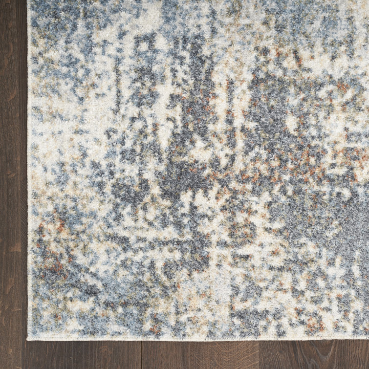 Ivory Abstract Synthetic 3'3" x 5' Easy-Care Area Rug