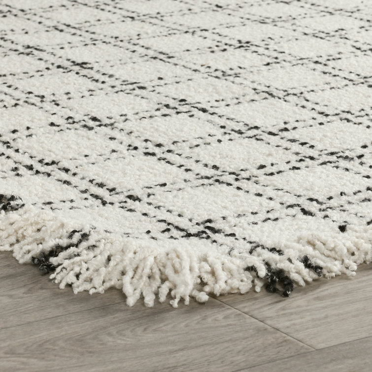 Ivory and Black Checkered Wool 5' x 8' Area Rug