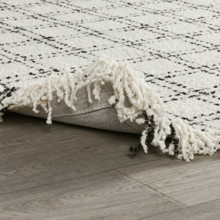 Ivory and Black Checkered Wool 5' x 8' Area Rug