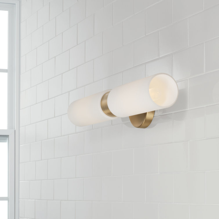 Aged Brass and White Glass Dual Cylinder Wall Sconce
