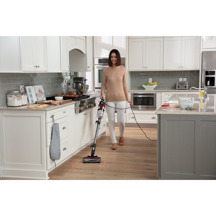 Clean View Slim Corded Stick Vacuum for Pets in Black and Red