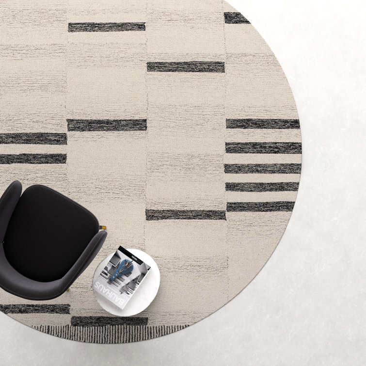 Elegant Hand-Tufted Black Wool Round 8' Rug