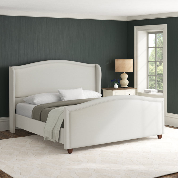 Carmen Antique White Pine King Bed with Upholstered Wingback Headboard