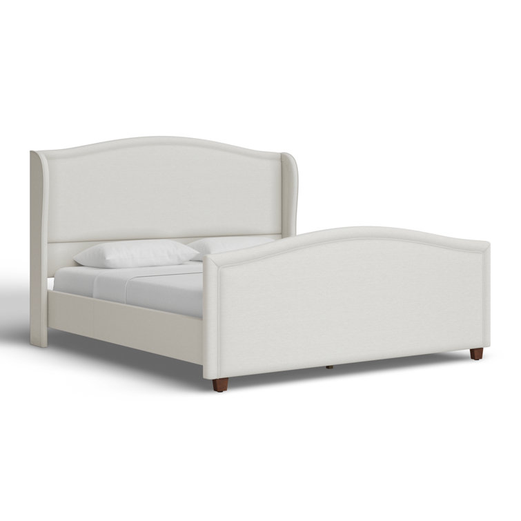 Carmen Antique White Pine King Bed with Upholstered Wingback Headboard