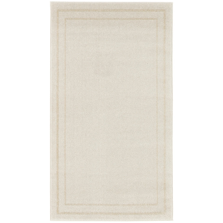 Ivory Solid Synthetic Low Pile Rectangle Rug 4' x 6'