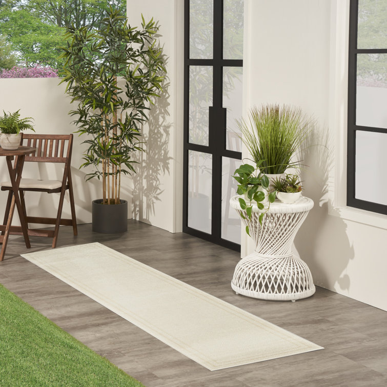 Ivory Solid Synthetic Low Pile Rectangle Rug 4' x 6'