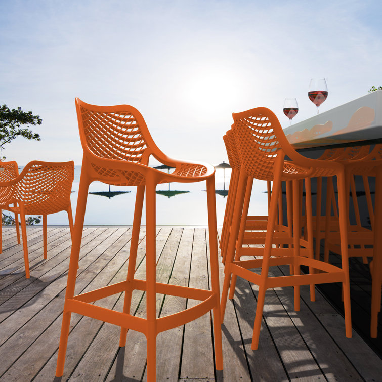 Farrah Orange Plastic Outdoor Bar Stools with Footrest, Set of 2
