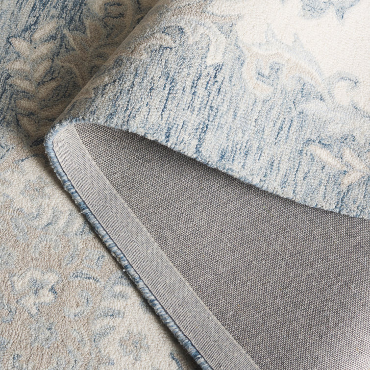 Ivory and Blue Handmade Wool Tufted 4' x 6' Rug