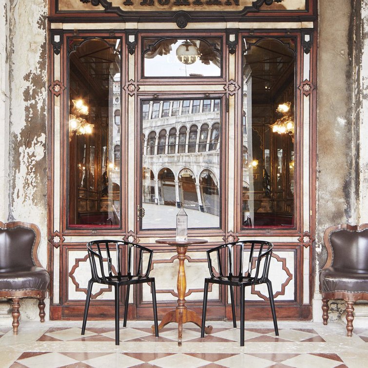 Venice Inspired Black Plastic Stackable Patio Dining Chair