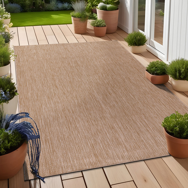 Beige 6' x 9' Synthetic Indoor/Outdoor Washable Rug