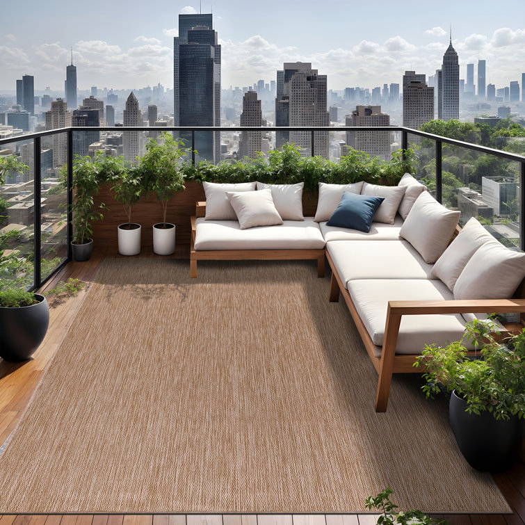 Beige 6' x 9' Synthetic Indoor/Outdoor Washable Rug