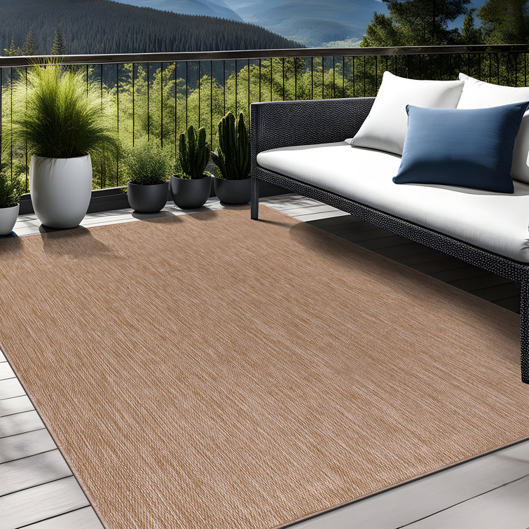 Beige 6' x 9' Synthetic Indoor/Outdoor Washable Rug