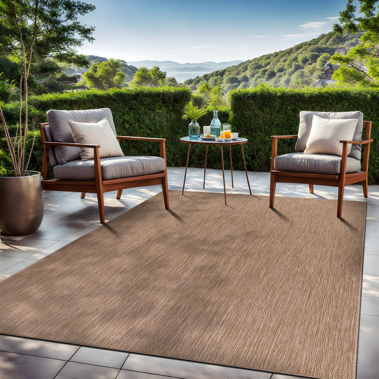Beige 6' x 9' Synthetic Indoor/Outdoor Washable Rug