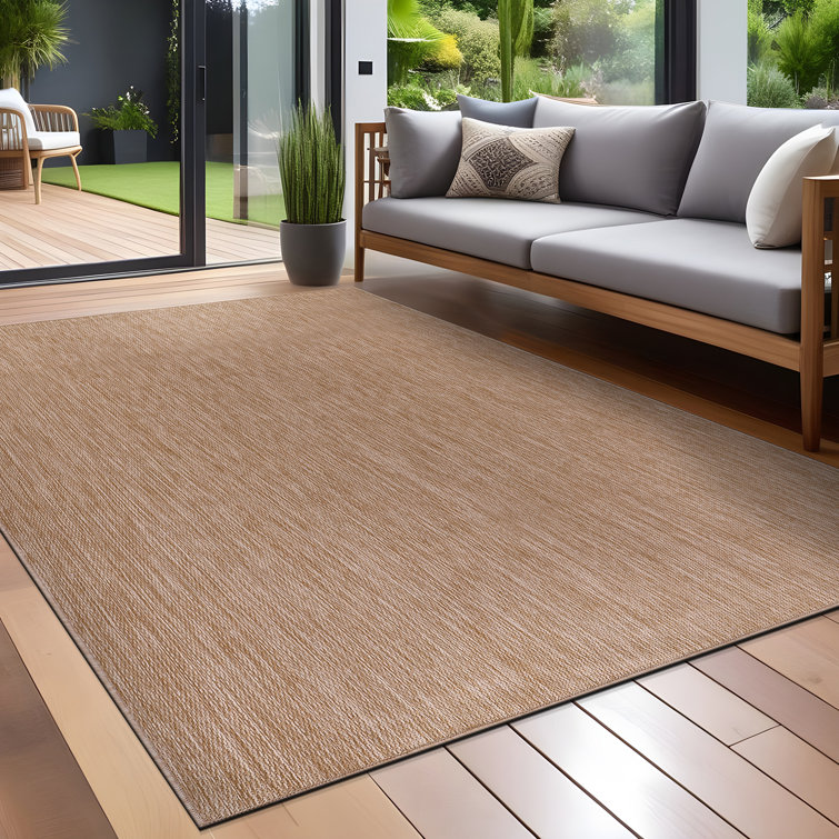 Beige 6' x 9' Synthetic Indoor/Outdoor Washable Rug