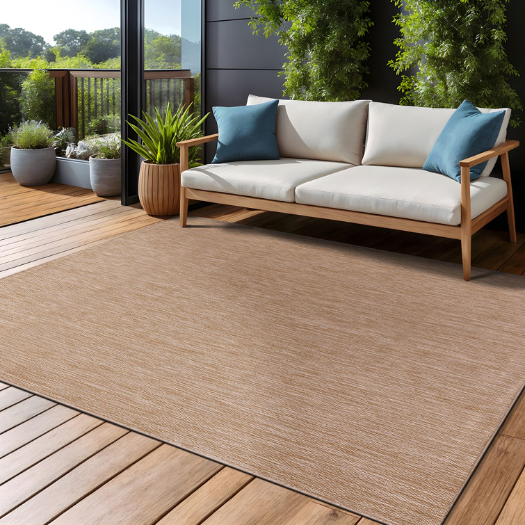 Beige 6' x 9' Synthetic Indoor/Outdoor Washable Rug