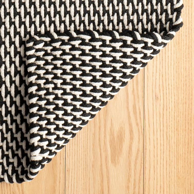 Braided Black/Ivory Geometric Synthetic Indoor/Outdoor Area Rug
