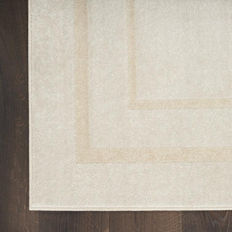 Ivory Rectangular Stain-Resistant Synthetic Indoor/Outdoor Rug