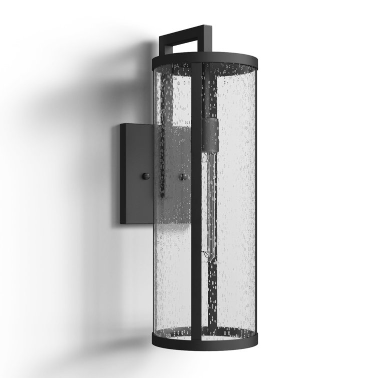 Medium Black Aluminum Cylinder Outdoor Wall Light with Seeded Glass