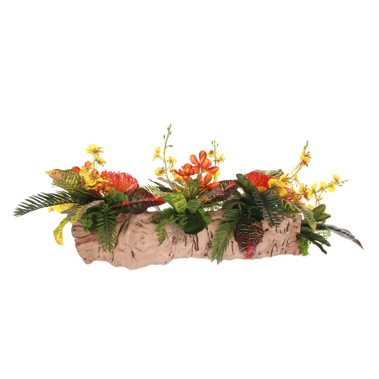 Vibrant Tropical Faux Flower Arrangement in Grapevine Log Planter