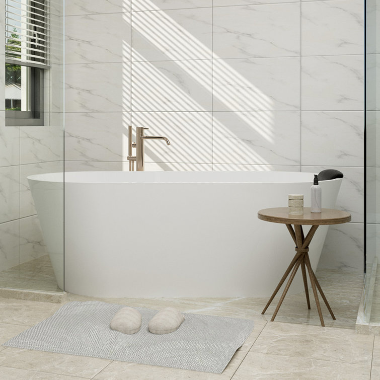 67" White Solid Surface Freestanding Soaking Tub with Black Pillow