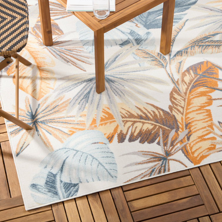 Ivory and Multicolor Tropical Foliage Synthetic Area Rug 5' x 7'