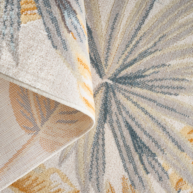 Ivory and Multicolor Tropical Foliage Synthetic Area Rug 5' x 7'