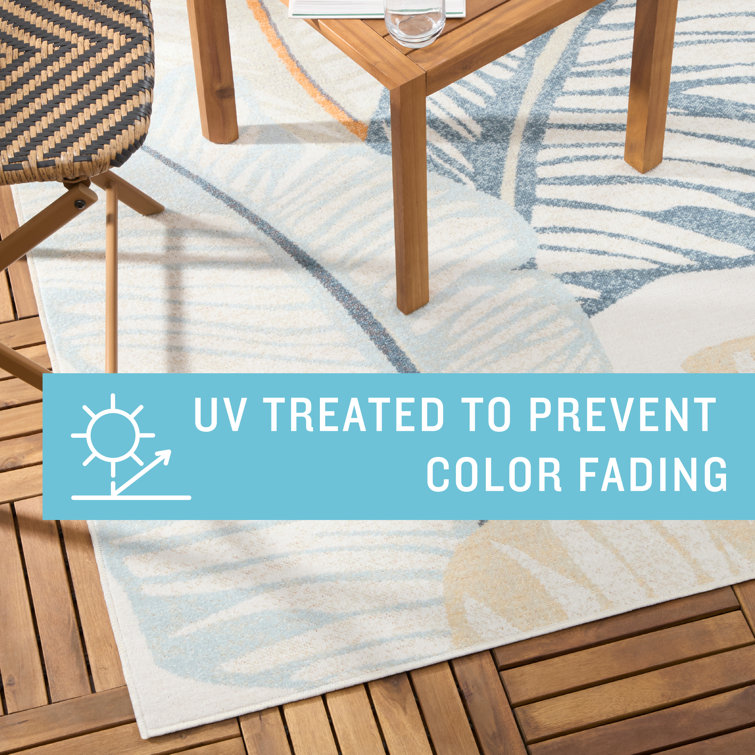 Ivory and Multicolor Synthetic Palm Fronds Indoor/Outdoor Rug