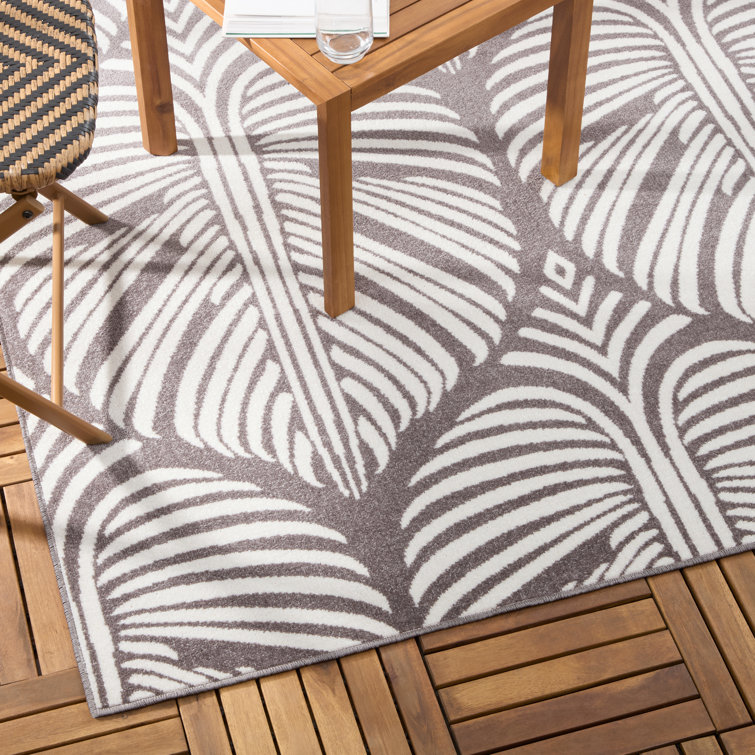 Dark Grey and Ivory Synthetic Palm Leaf Indoor/Outdoor Area Rug
