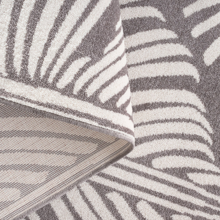 Dark Grey and Ivory Synthetic Palm Leaf Indoor/Outdoor Area Rug