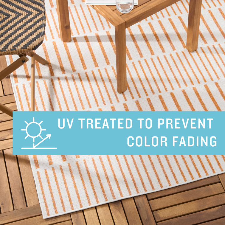 Ivory and Orange Synthetic Stripe Indoor/Outdoor Area Rug