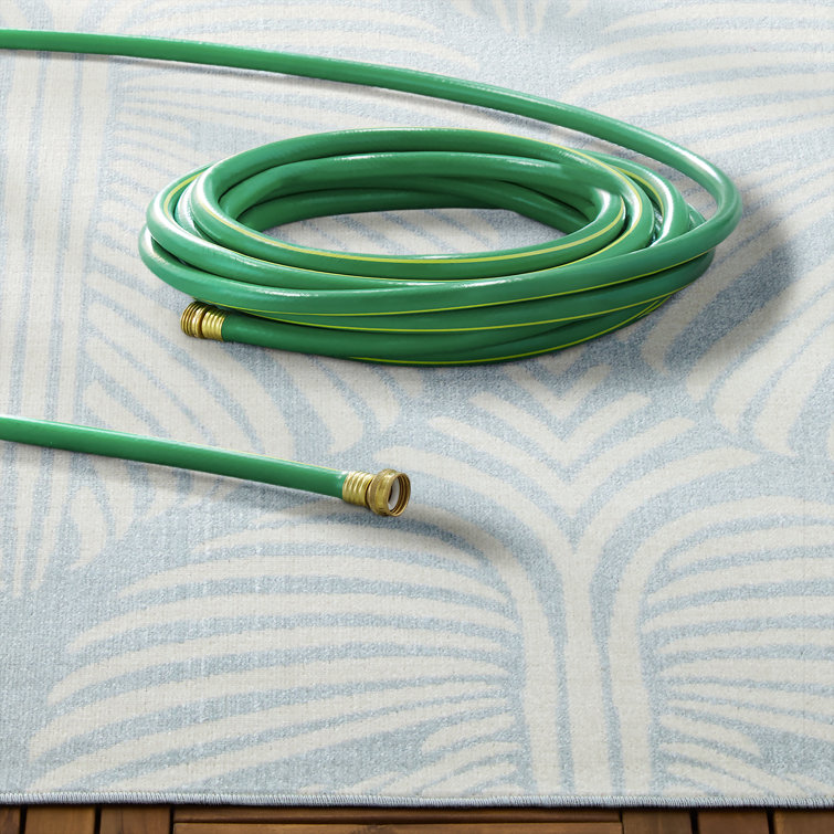 Lanai Blue and Ivory Synthetic Palm Leaves Rectangular Rug